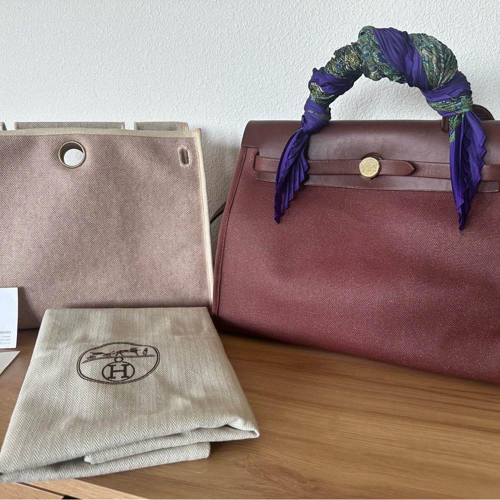 Herbag PM 31 burgundy coated canvas 2-way leather bag with strap and accessories